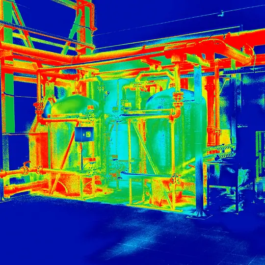 Imagem térmica de uma instalação industrial, em azul, verde e vermelho
